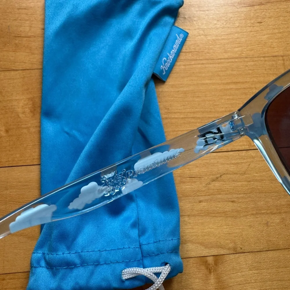 Kids Clear Blue Cloud Pattern Sunglasses with blue lenses